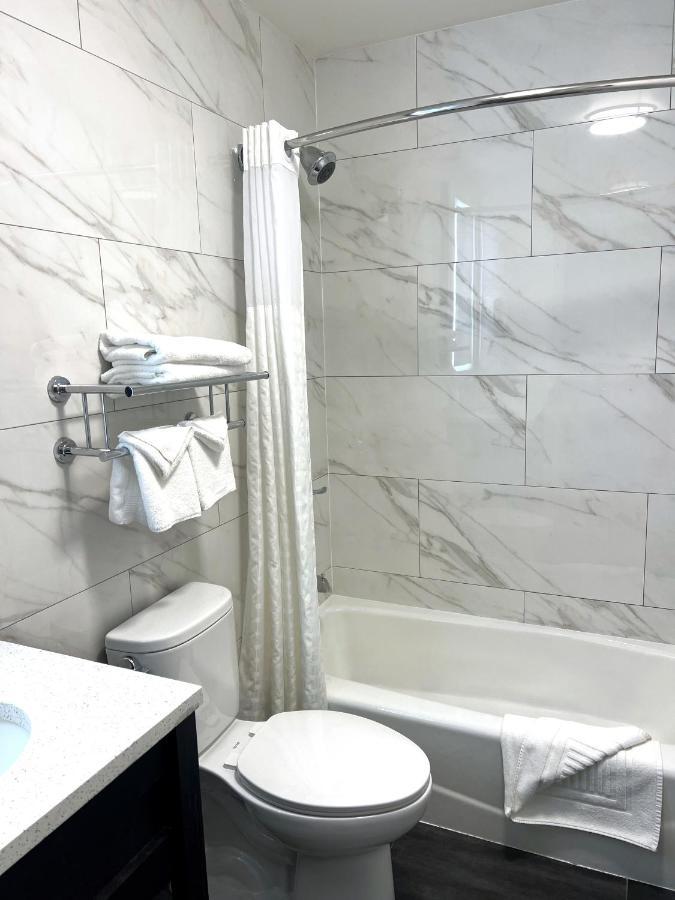 Lotus Blu Inn & Suites Nova York Exterior foto